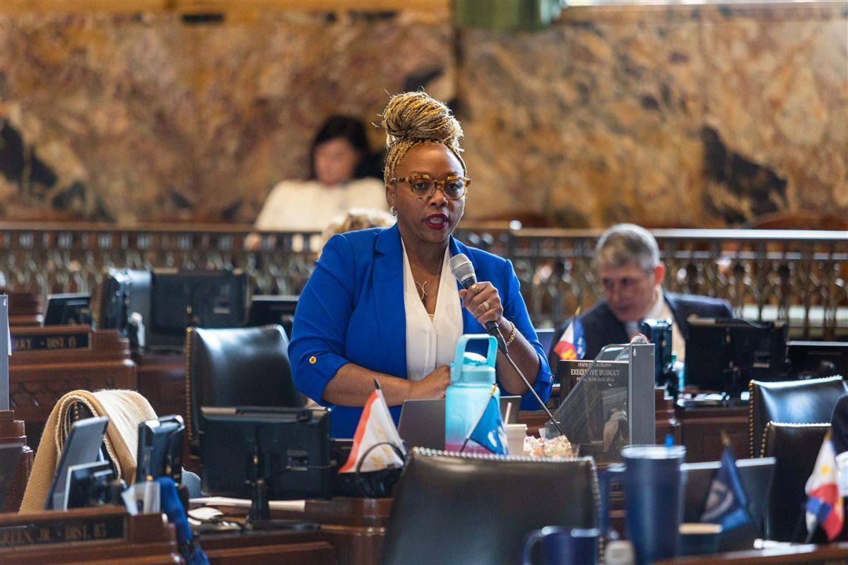 Candace N. Newell sharing a warm moment at the Capitol