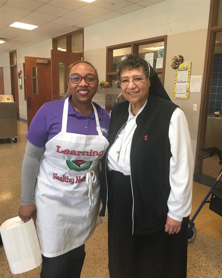 Candace N. Newell with volunteers